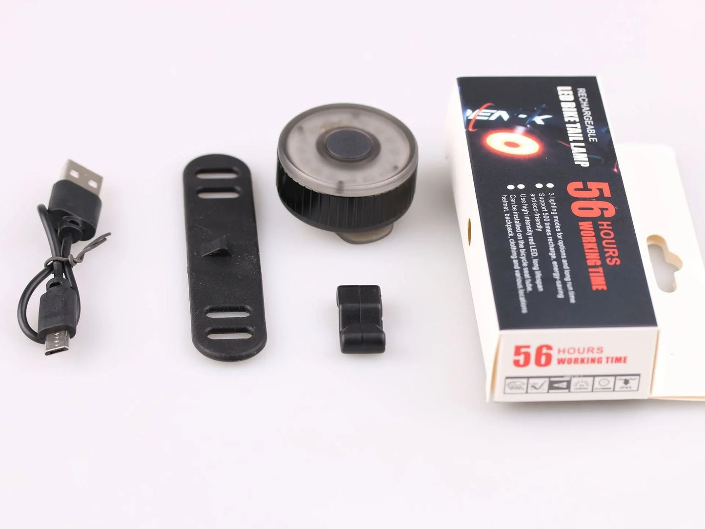 Rechargeable LED bike tail light set with USB cable, mounting strap, and retail box, 56 hours battery life.